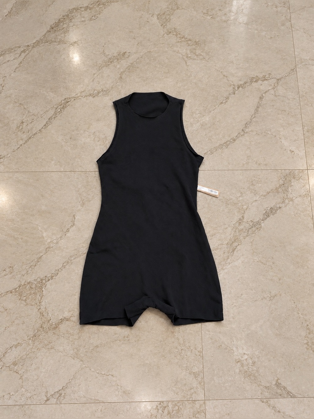 SKIMS Raw Edge Onesie Black Sleeveless Romper
